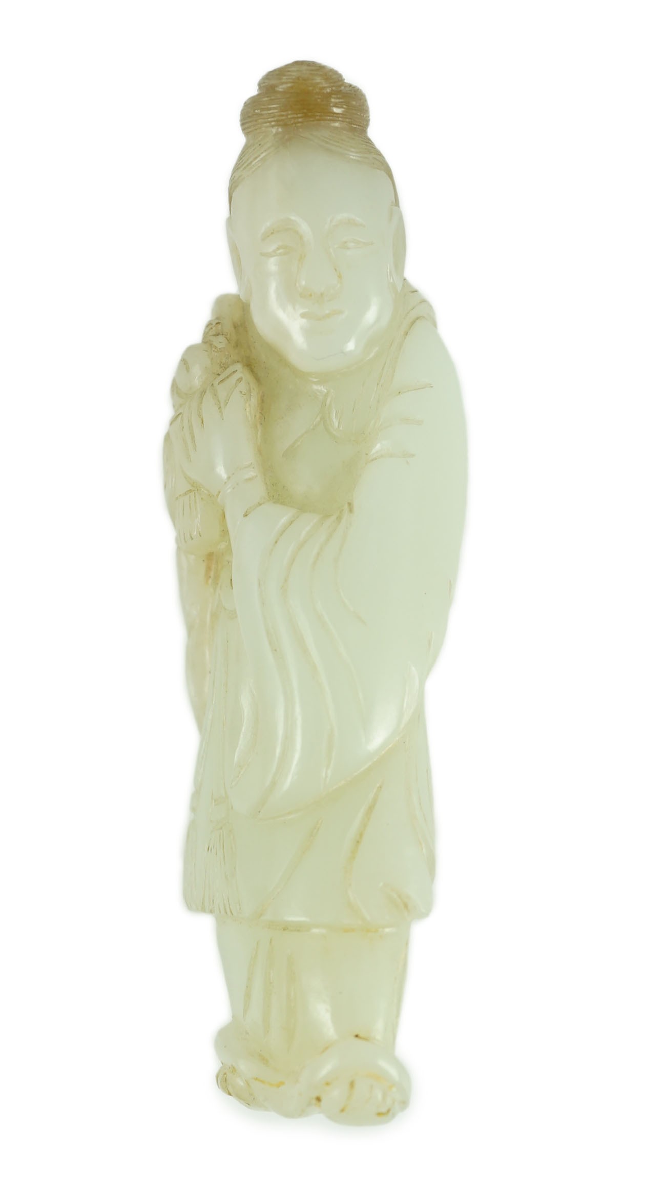 A Chinese pale celadon jade figure of a lady, possibly He Xiangu, 19th century, 10.7cm high